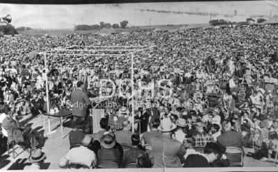Black and white photograph of Adlai Stevenson speaking at Plowville event