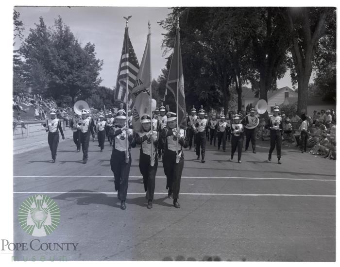 Neighboring band struts their stuff down parade route