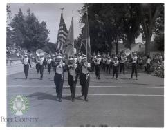 Neighboring band struts their stuff down parade route