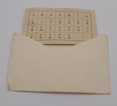 Card, alphanumeric code trade card in envelope