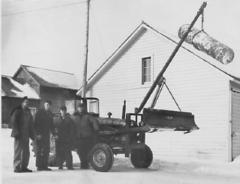 (?), Alvin Harmon Dale Fultz & Pastor Spencer Bower Next to a Tractor, 1957-1958.