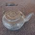 black wooden handled kettle