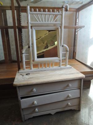 Doll's white bureau