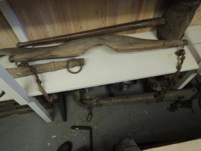 yoke for hauling water, etc., used by humans.