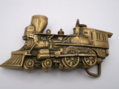 Brass belt buckle, train