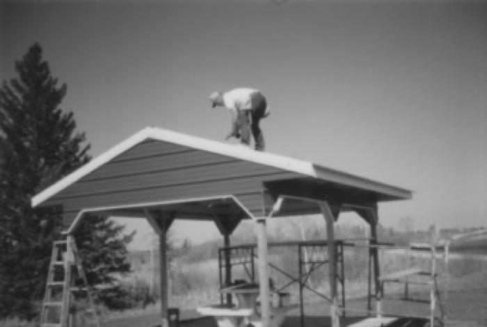 CCHS, Securing the Roof on the Weme Park Shelter, 1998.